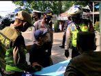 Yustisi Masker di Kalideres, Petugas Tindak Warga Langgar Prokes