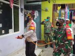 Memutus Mata Rantai Covid 19, Polisi Dan TNI Lakukan Penyemprotan Disinfektan