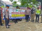 Sosialisasikan Prokes dan PPKM Mikro, Polsek Cisauk dan Tiga Pilar Bagikan 200 Masker Gratis