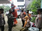 Berikan Edukasi Humanis, Kapolsek Kebon Jeruk Bawa Ondel Ondel