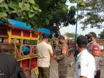 Tiga Pilar Kembangan Menertibkan Pedagang yang Langgar Aturan PPKM Darurat