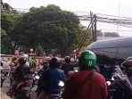Imbas Pembagian Sembako di Pusdiklantas Polri Menimbulkan Kemacetan yang Cukup Panjang
