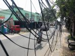 Benyamin Akan Benahi Tiang dan Kabel Optik Semrawut di Tangsel